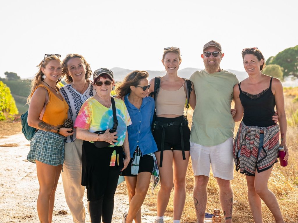 group photo of seven people during a nature walk