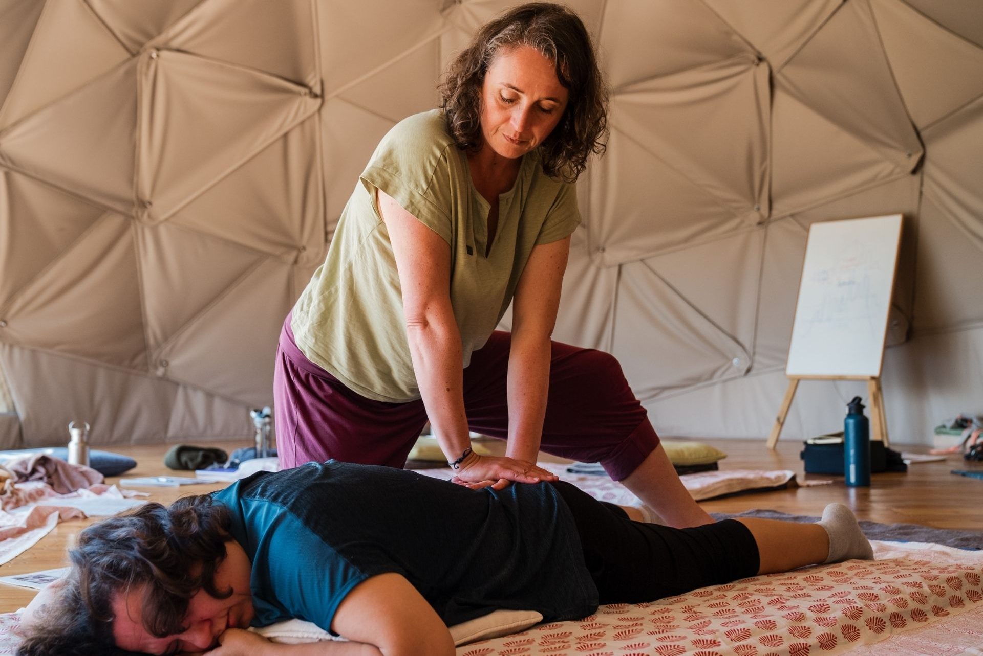 Katrin demonstrating a Thai Massage move